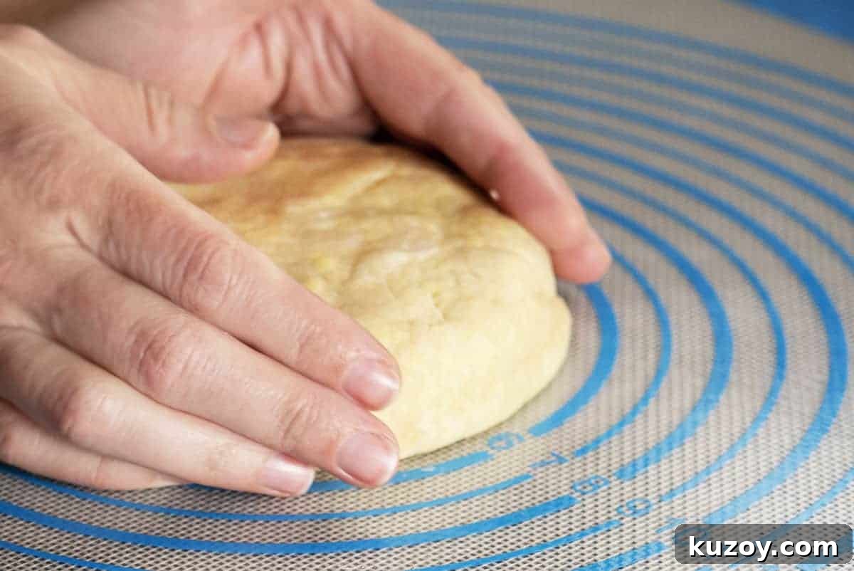 Flaky Lard Pie Crust Recipe for Perfect Homemade Pies 8 forming pie crust disc
