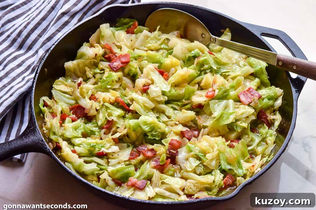 Fried cabbage with bacon in a cast iron skillet
