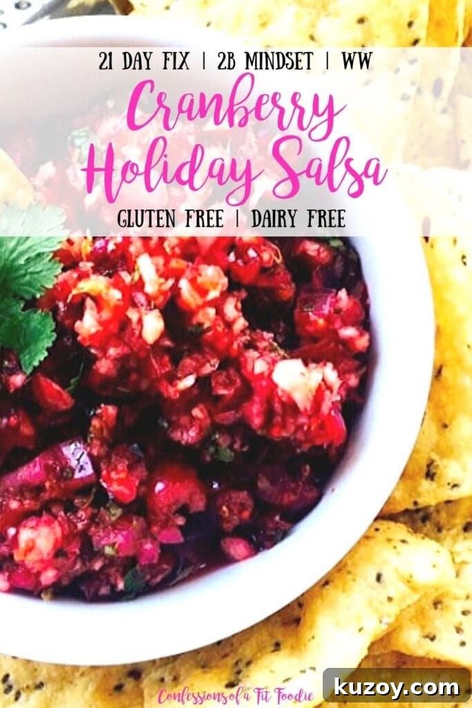 Festive Cranberry Salsa Recipe for Holiday Entertaining 6 Close up photo of Cranberry Holiday Salsa in a white bowl with tortilla chips and the text overlay- 21 Day Fix | 2B Mindset | WW | Cranberry Holiday Salsa | Gluten Free | Dairy Free | Confessions of a Fit Foodie