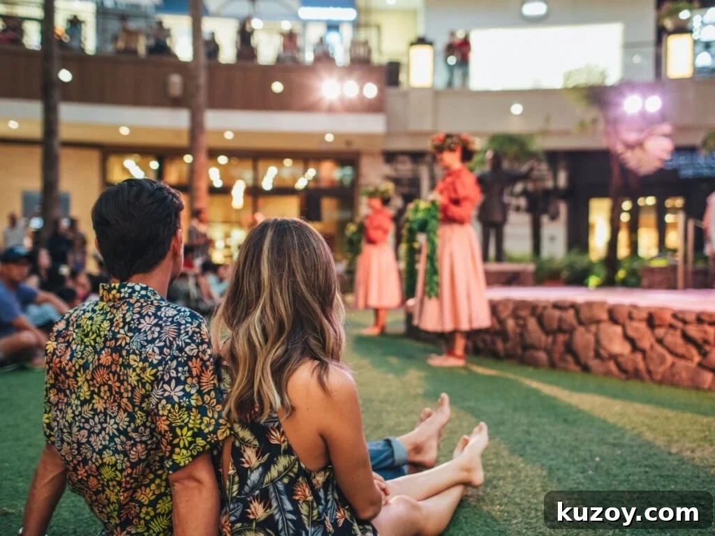 Waikīkī Live Music & Hula Show Guide (Updated 2026) 4 Couple watching the O Nā Lani Sunset Stories Hula Show at International Market Place.