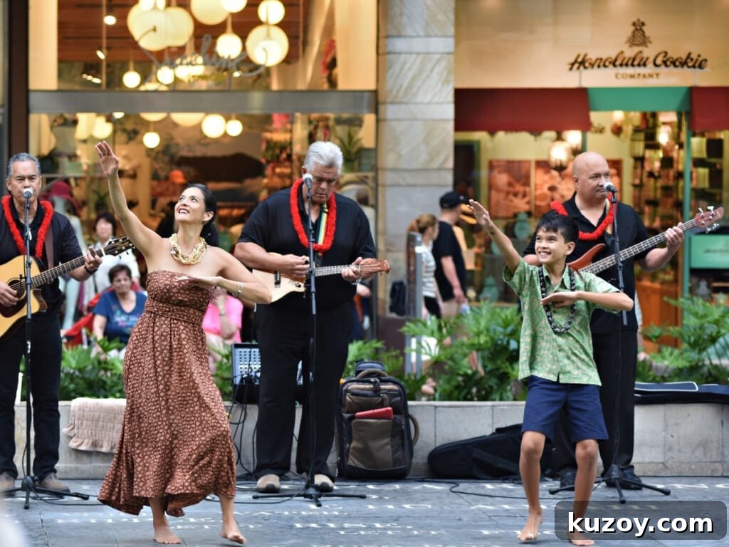 Waikīkī Live Music & Hula Show Guide (Updated 2026) 6 Kū Haʻaheo hula performance with band at Waikiki Beach Walk.