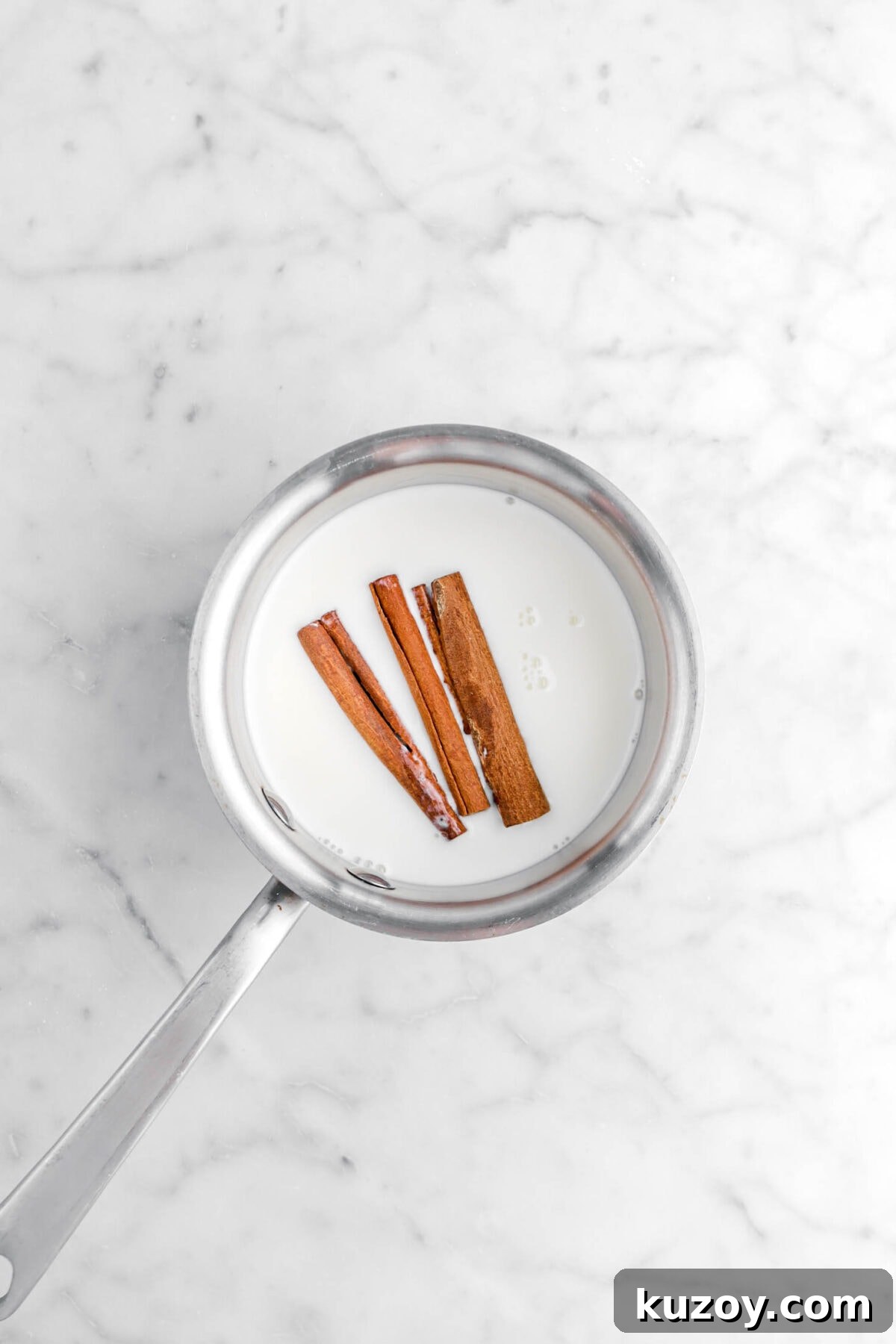 Cinnamon Sugar Walnut Pull-Apart Bread Recipe 9 cinnamon sticks and milk in small pot