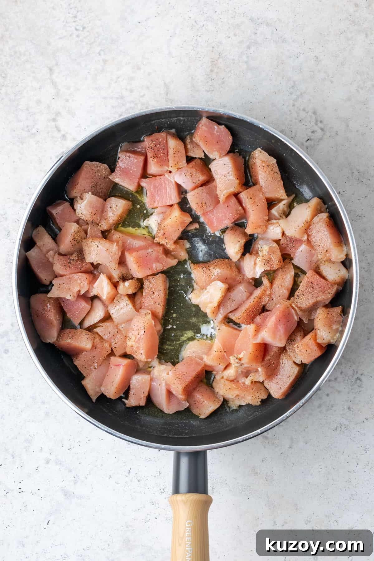 30-Minute Marry Me Chicken Pasta Recipe for Date Night 6 Chicken pieces being cooked in the saute pan.