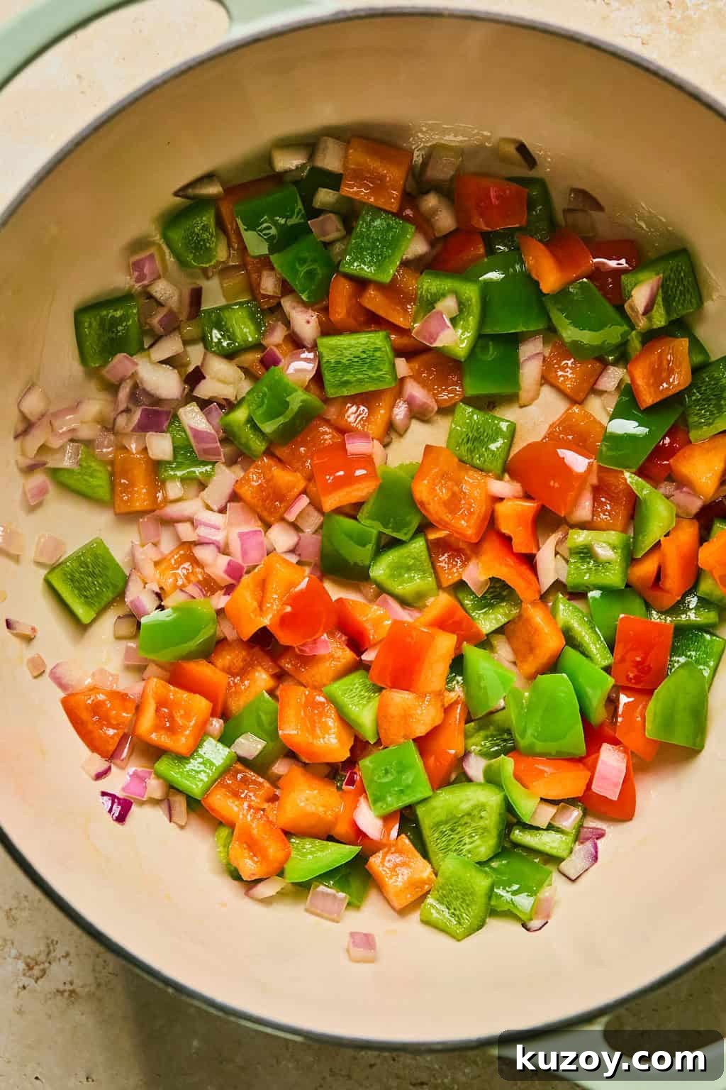 Hearty Butternut Squash & White Bean Chili Recipe 5 Sautéed onions and pepper in pot.