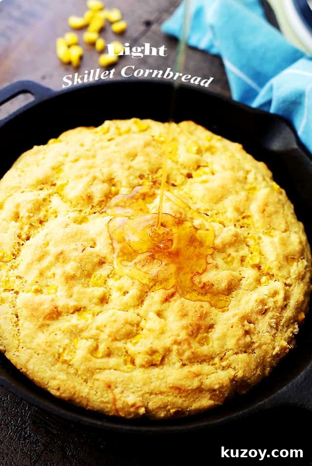 This skillet cornbread recipe is made from scratch and loaded with cheese and sweet corn. Crispy on the edges and fluffy on the inside! Light Skillet Cornbread baked to golden perfection, ready to be served