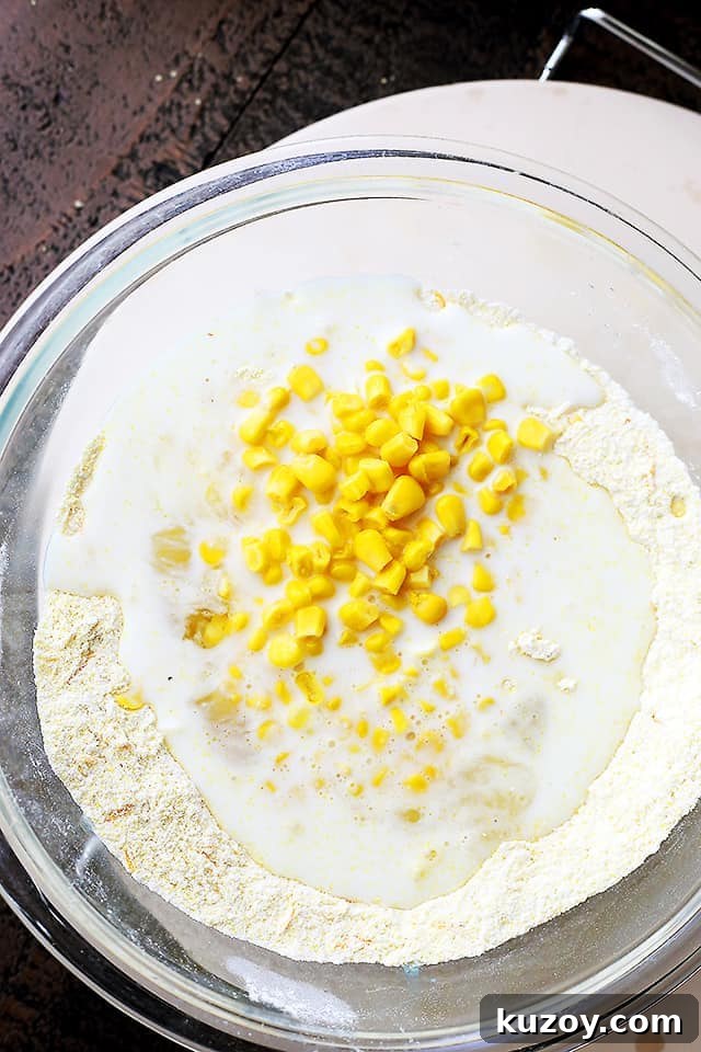 Loaded with fresh corn and a handful of cheddar cheese, this flavorful, lightened-up cornbread is the perfect side for your soup or chili! Kernels of sweet corn and sharp cheddar cheese are combined into the batter