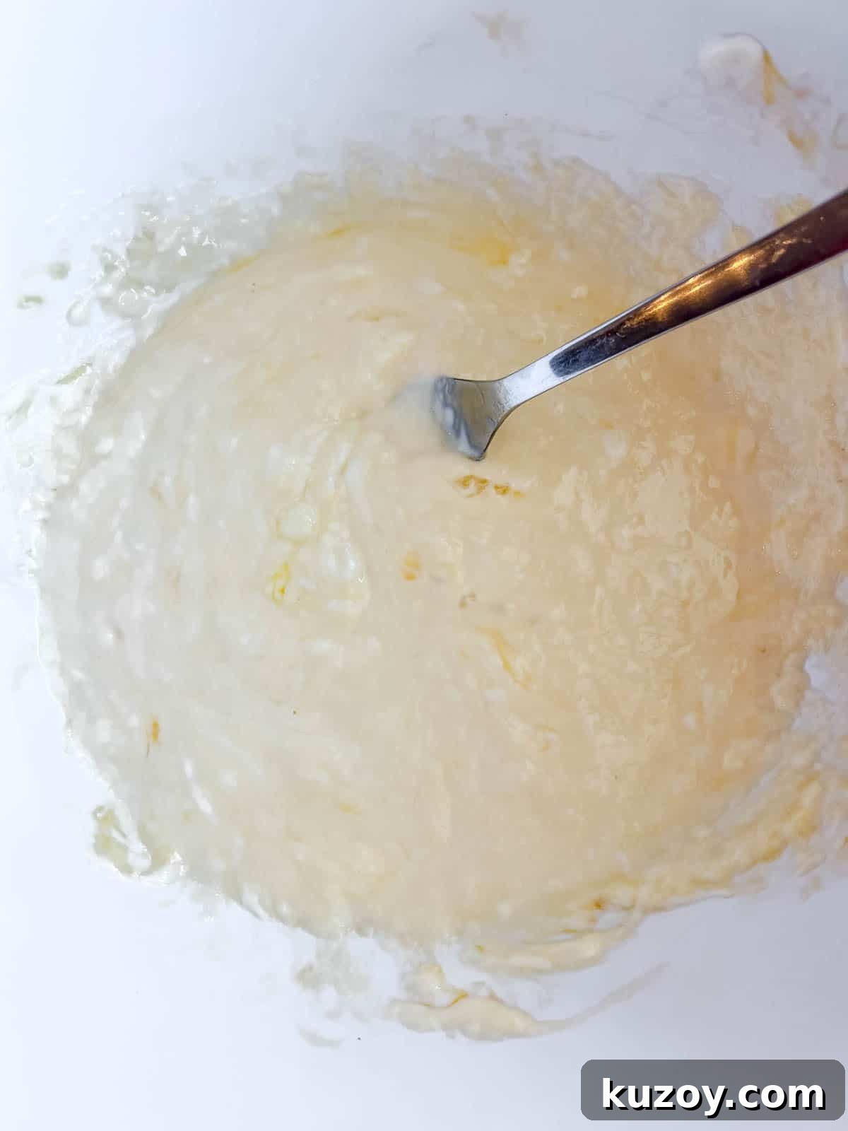 Fluffy Greek Yogurt Pancakes for Light, Protein-Packed Breakfast 4 Eggs and yogurt mixed together.
