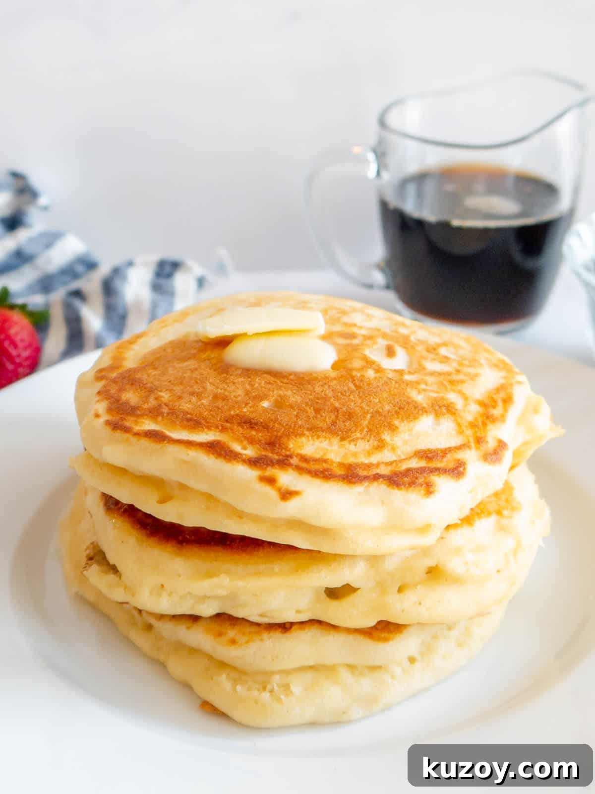 Fluffy Greek Yogurt Pancakes for Light, Protein-Packed Breakfast 10 High protein pancakes stacked on top of each other.