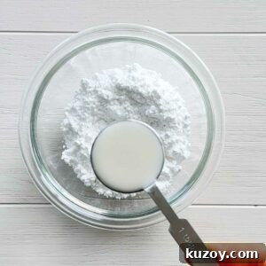 Vanilla Bean Glaze Recipe for Cakes, Donuts, and Pastries 4 Mixing glaze