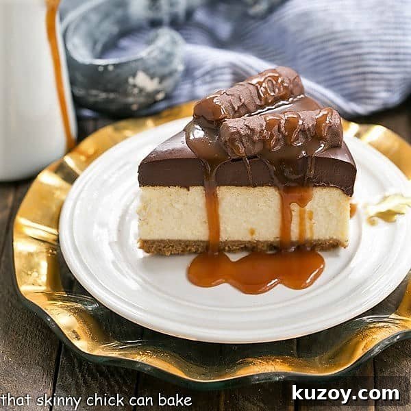 Twix Cheesecake - A dream cheesecake for chocolate and caramel lovers! Twix Cheesecake slice drizzled with caramel.