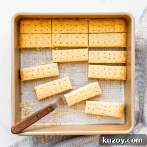 Simple 1-2-3 Shortbread Cookies Recipe for Perfect Crunch 9 Shortbread cookies cut into sticks in a square pan.