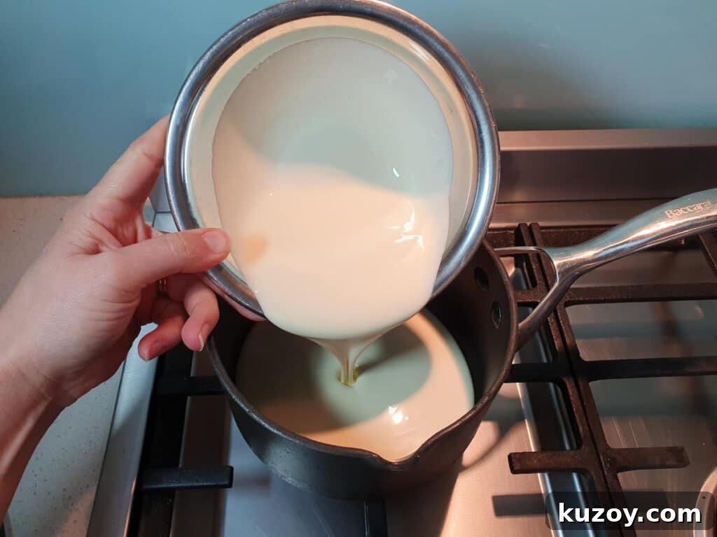adding cream to pot.