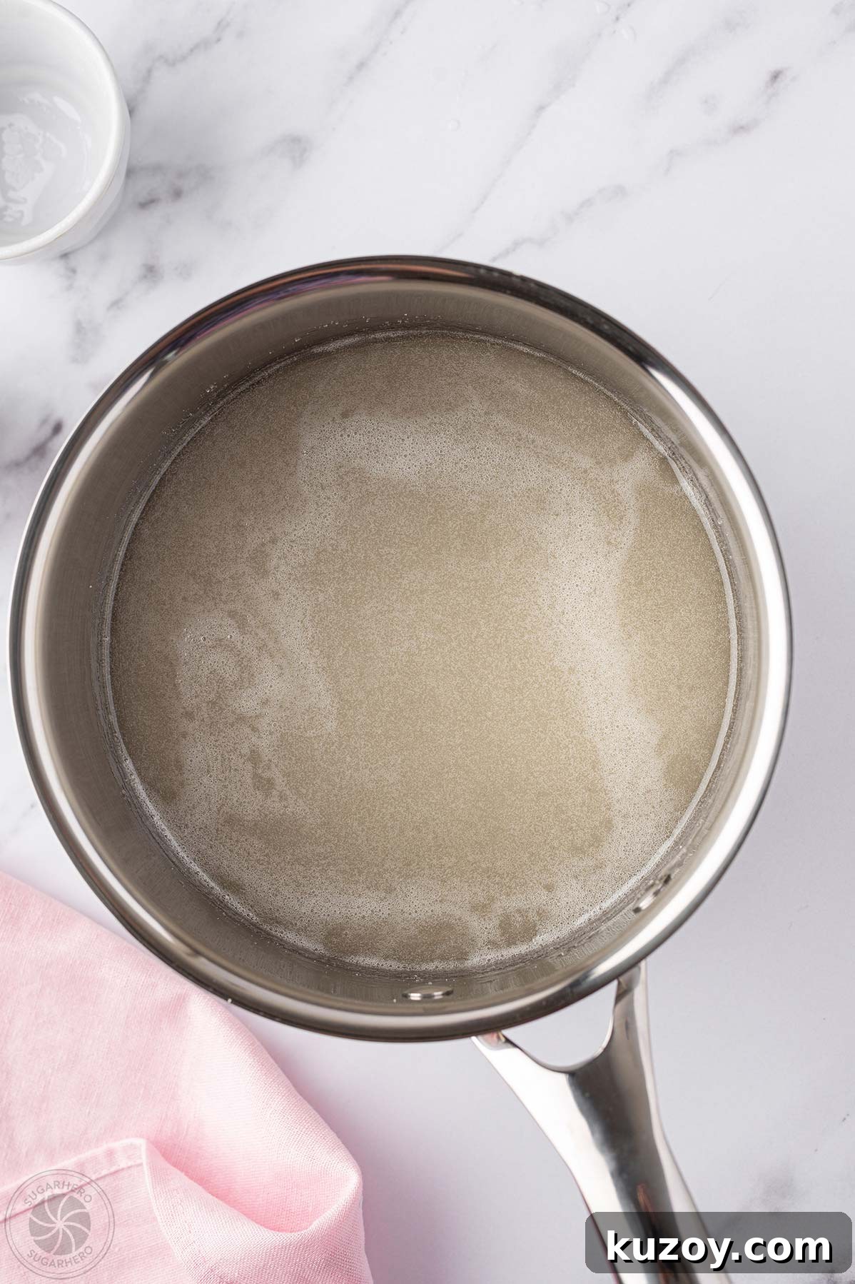 How to Make Smooth Homemade Caramel Sauce for Desserts 12 Caramel sauce mixture in a saucepan.
