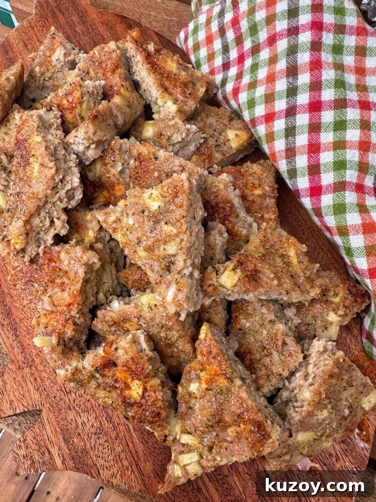 Sheet-Pan Breakfast Sausage and Roasted Veggies for Busy Mornings 2 Triangles of sheet pan breakfast sausage