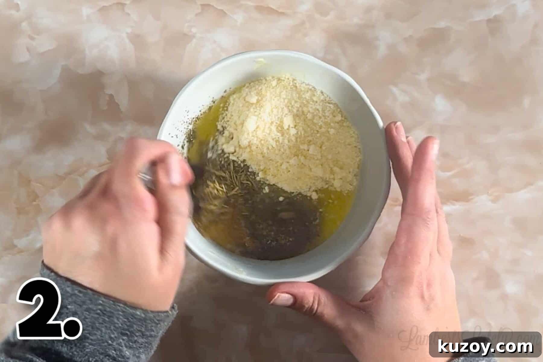 stirring butter and seasonings in a small bowl.