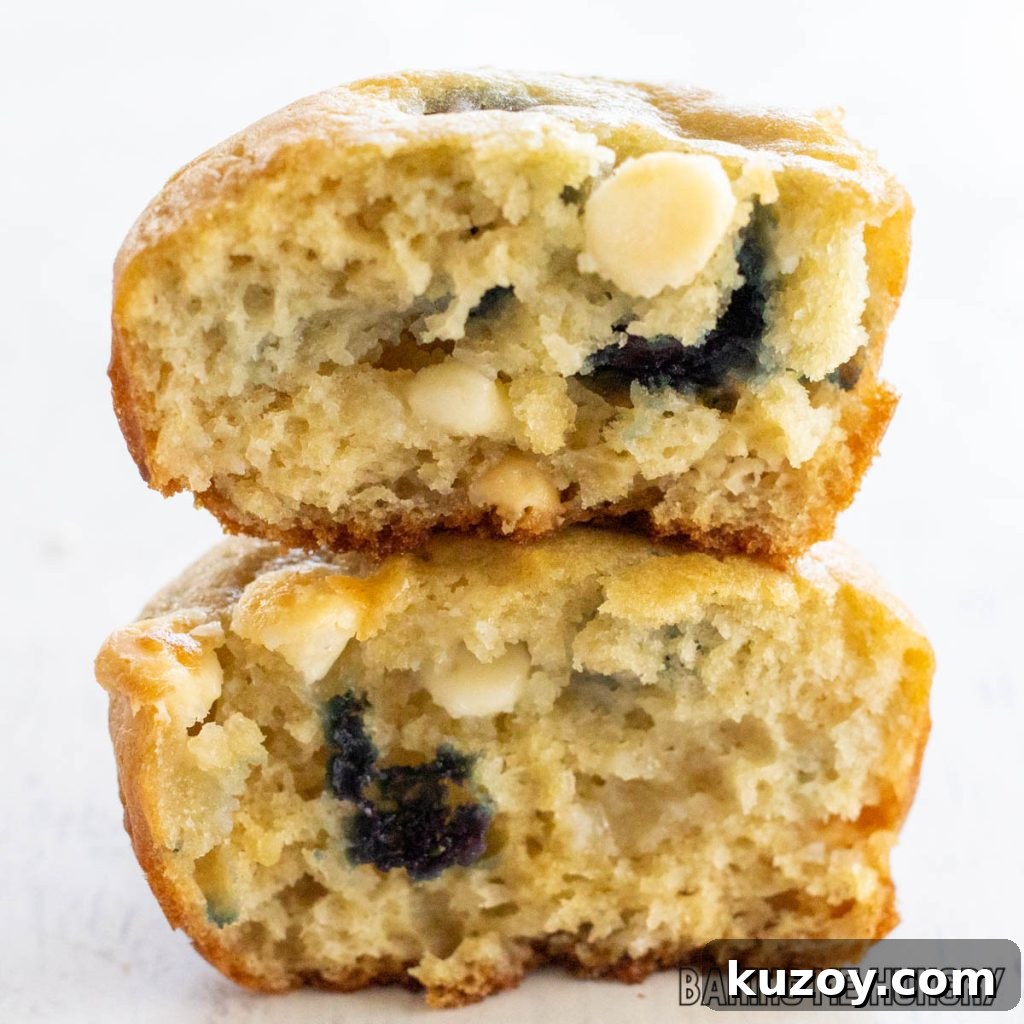 blueberry white chocolate muffins halved and stacked