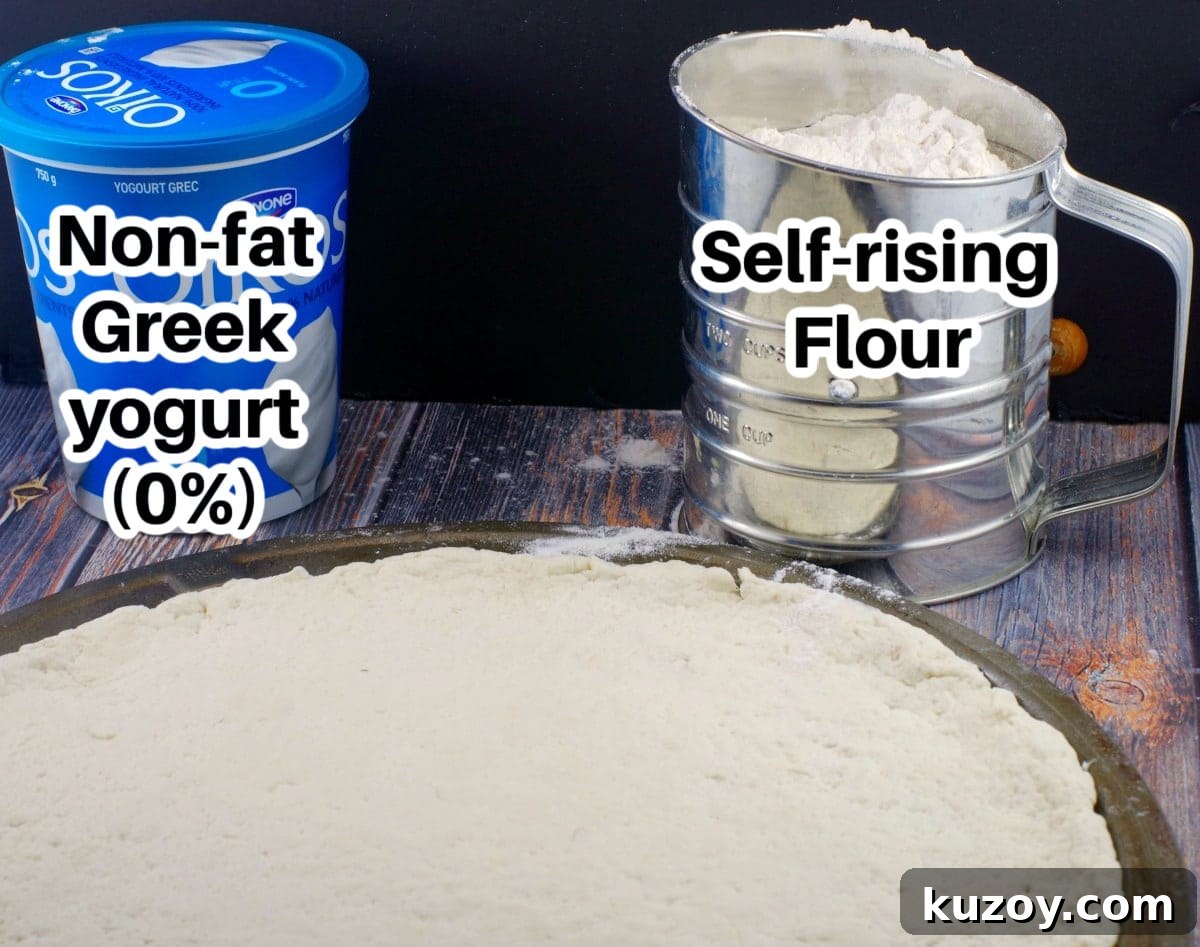 Weight Watchers Pizza Recipe with 2-Ingredient Dough 3 Greek yogurt and self rising flour, labelled with 2 ingredient pizza dough in front