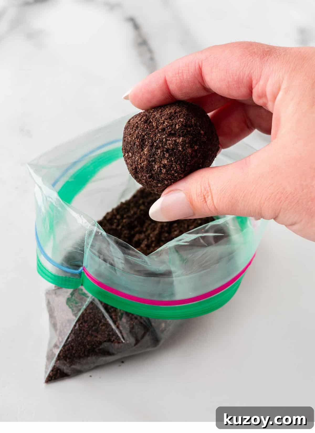 roll oreo balls in oreo crumbs