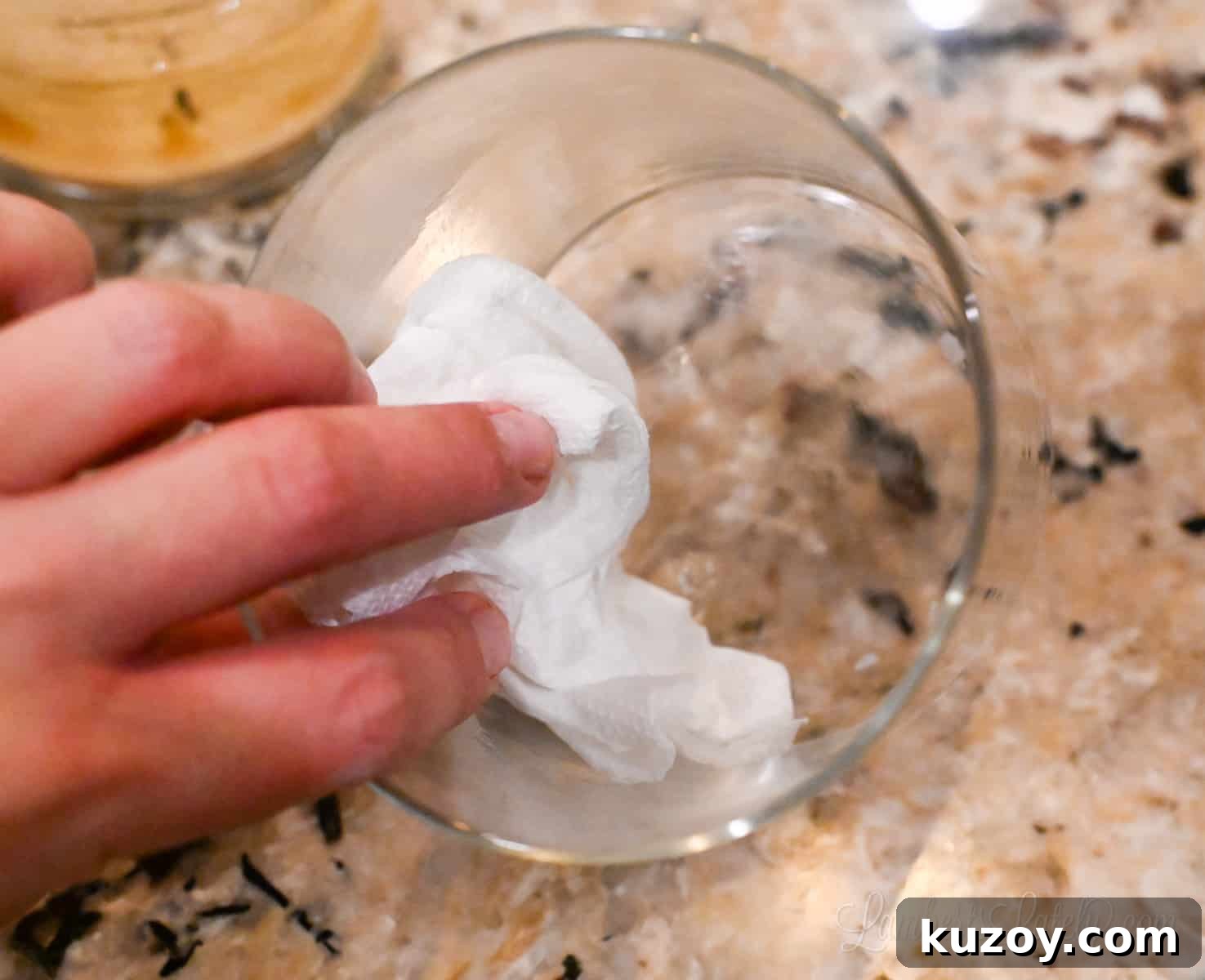 Remove Wax from Candle Jars: 3 Fast, Effective Methods 13 wiping out an empty candle jar with a paper towel.