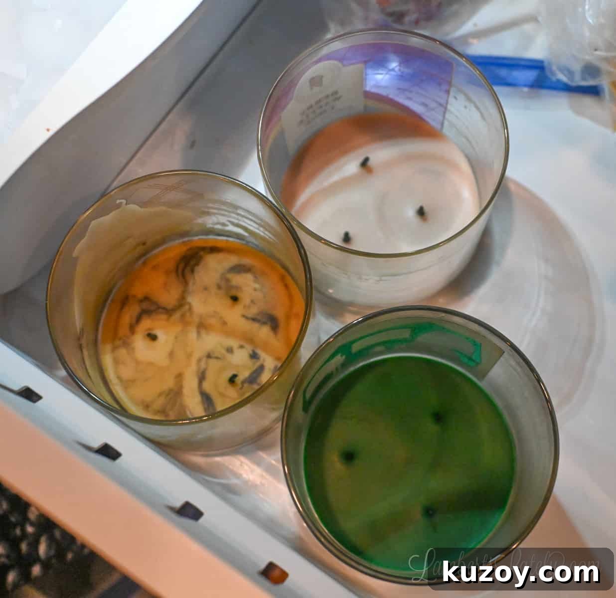 Remove Wax from Candle Jars: 3 Fast, Effective Methods 5 three used candles in the freezer.