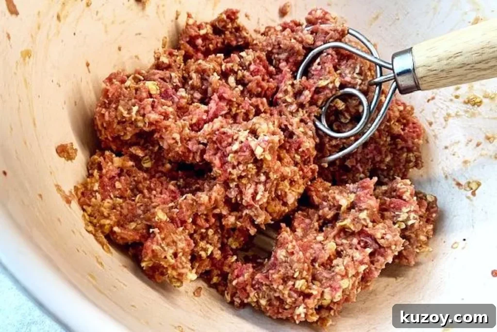 Mouthwatering Meatloaf Recipe That Tastes Like Comfort Food 3 mixing the meatloaf