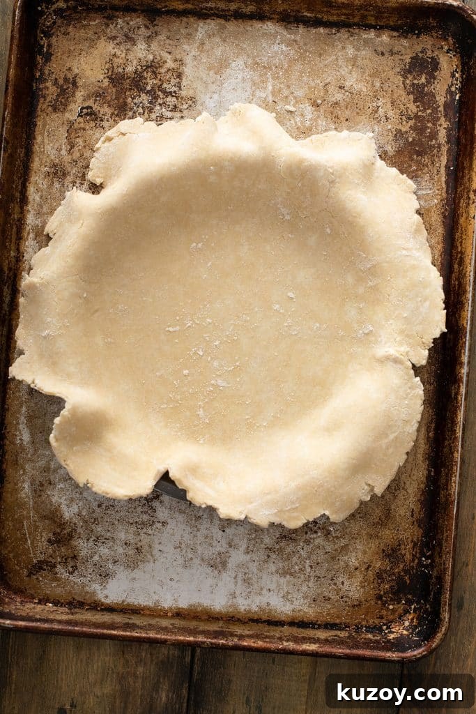Decadent Chocolate Pecan Pie with Gooey Filling 5 Homemade Pie Crust dough over a pie dish