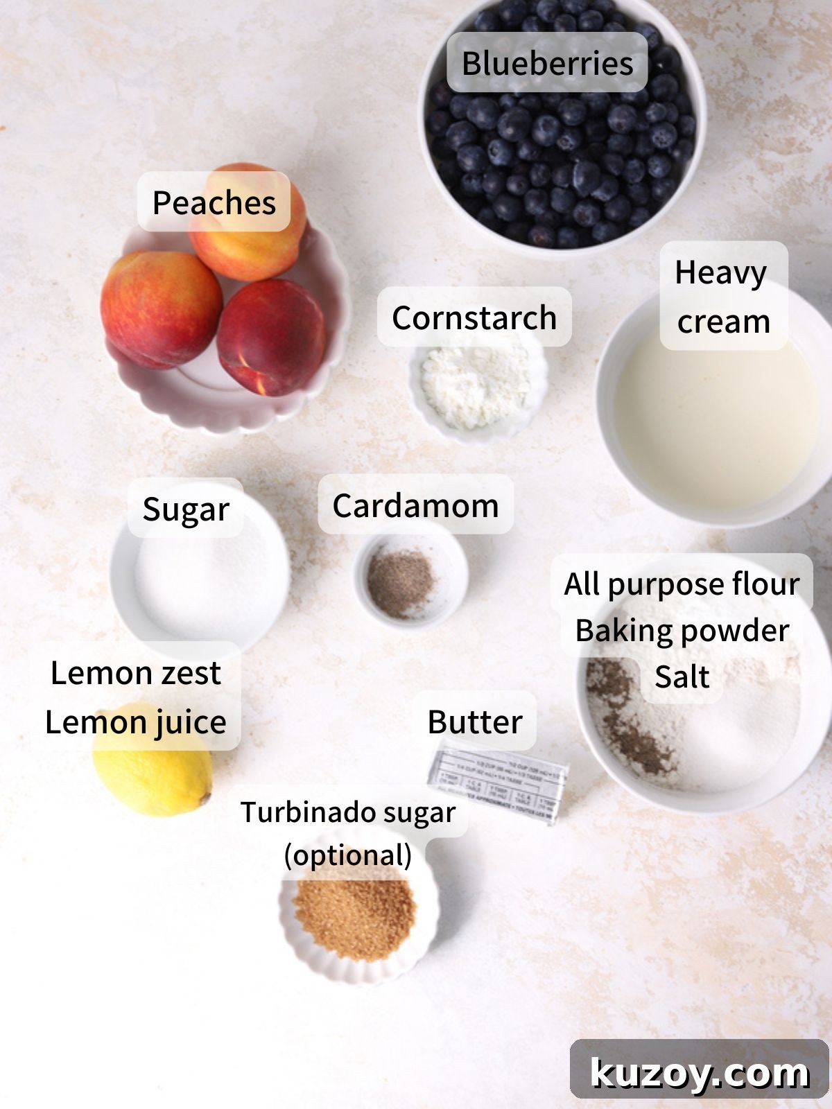Peach Blueberry Cobbler Recipe: Sweet Summer Fruit Cobbler 3 Labeled ingredients needed to make peach blueberry cobbler laid out on a table.