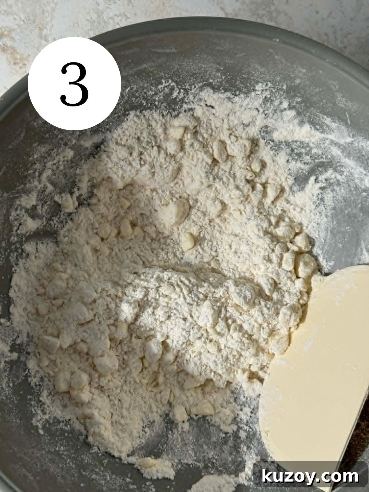 Peach Blueberry Cobbler Recipe: Sweet Summer Fruit Cobbler 6 Butter cut into flour in a bowl with a bench scraper.