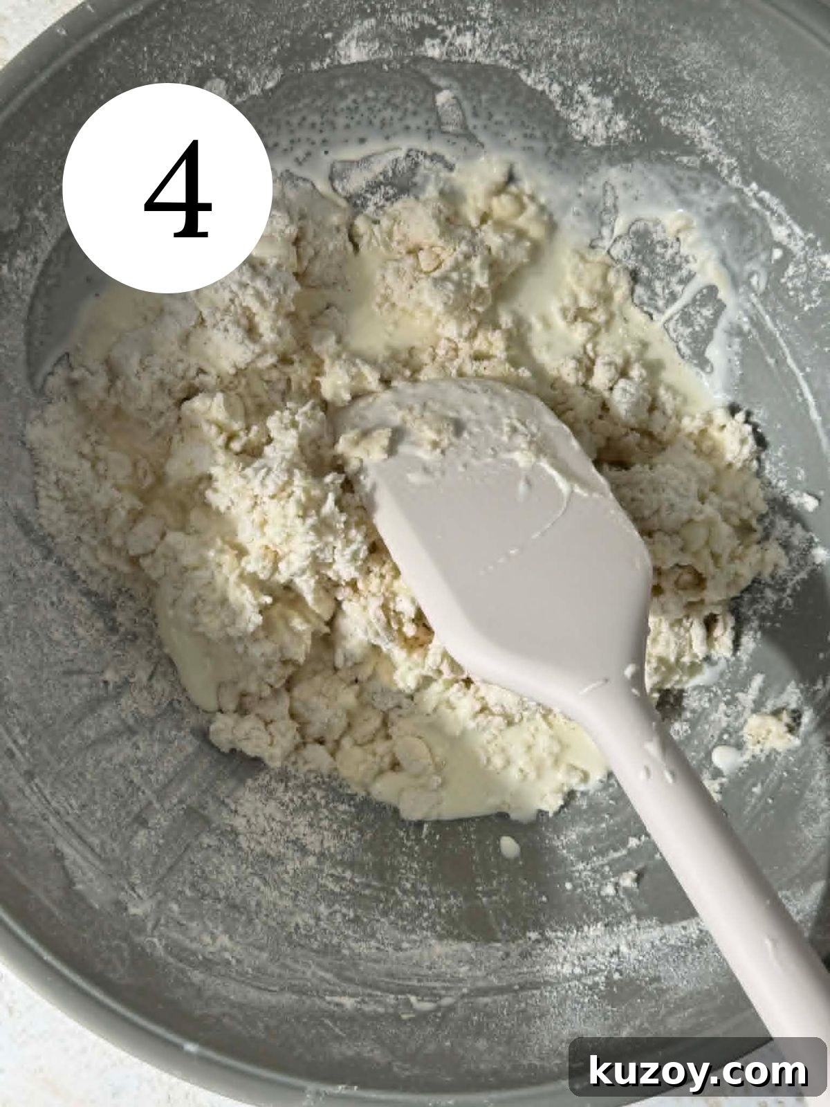Peach Blueberry Cobbler Recipe: Sweet Summer Fruit Cobbler 7 Cream added to a mixture of butter and flour in a bowl with a spatula.