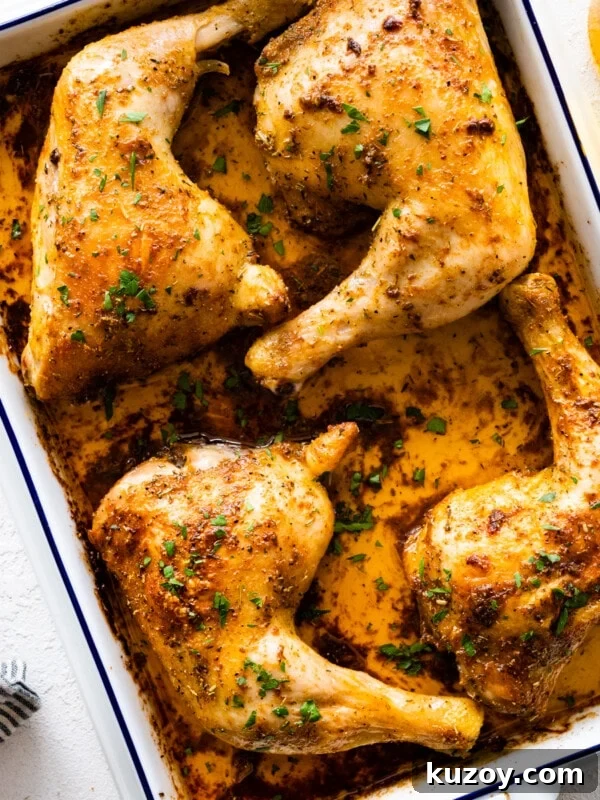 Authentic Chicken Cacciatore Recipe: Classic Italian Stew 18 Baked chicken leg quarters in a white baking dish.
