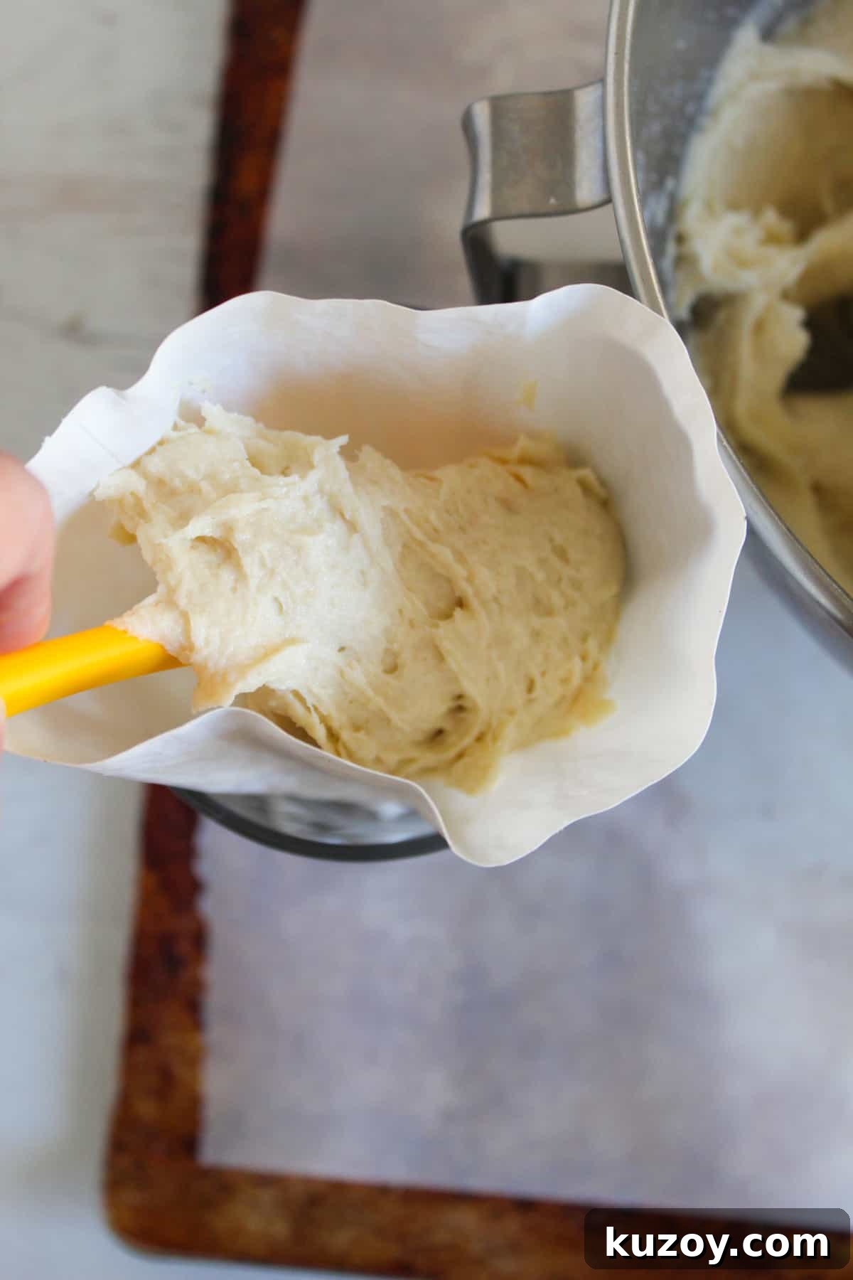 Gluten-Free Breadsticks Recipe That Will Impress Everyone 10 placing bread dough in a pastry bag