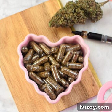How to Cook with Decarbed Cannabis: Edible Recipes & Tips 10 Cannabis capsules in a pink heart-shaped dish with cannabis buds and dropper.