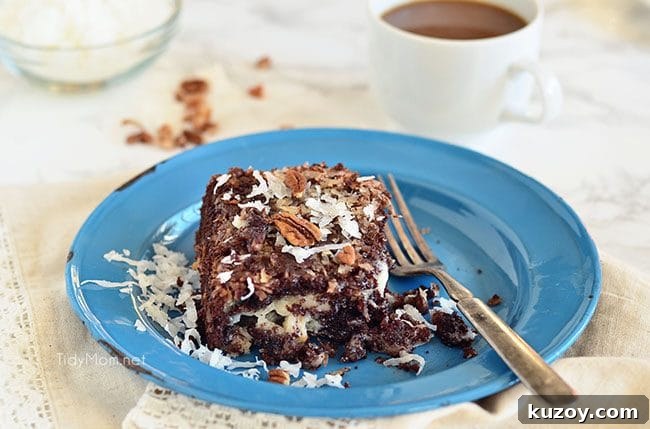 Gooey Upside Down German Chocolate Cake on blue plate