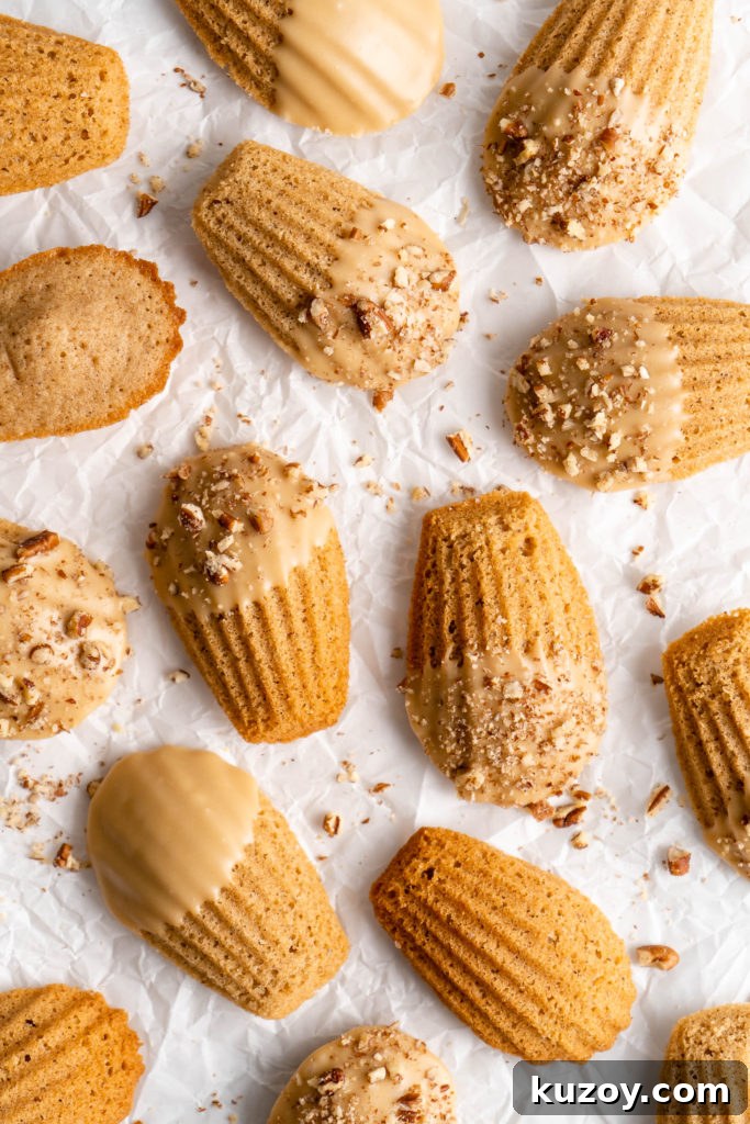 Maple Chai Madeleines Recipe: Spiced Tea-Infused French Cookies 4 maple chai spiced madeleines dipped in a maple glaze and sprinkled with crushed pecans