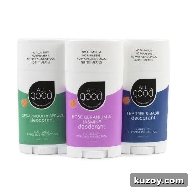 Three natural deodorant sticks from All Good with different scents - Cedarwood & Spruce, Rose Geranium & Jasmine, and Tea Tree & Basil.