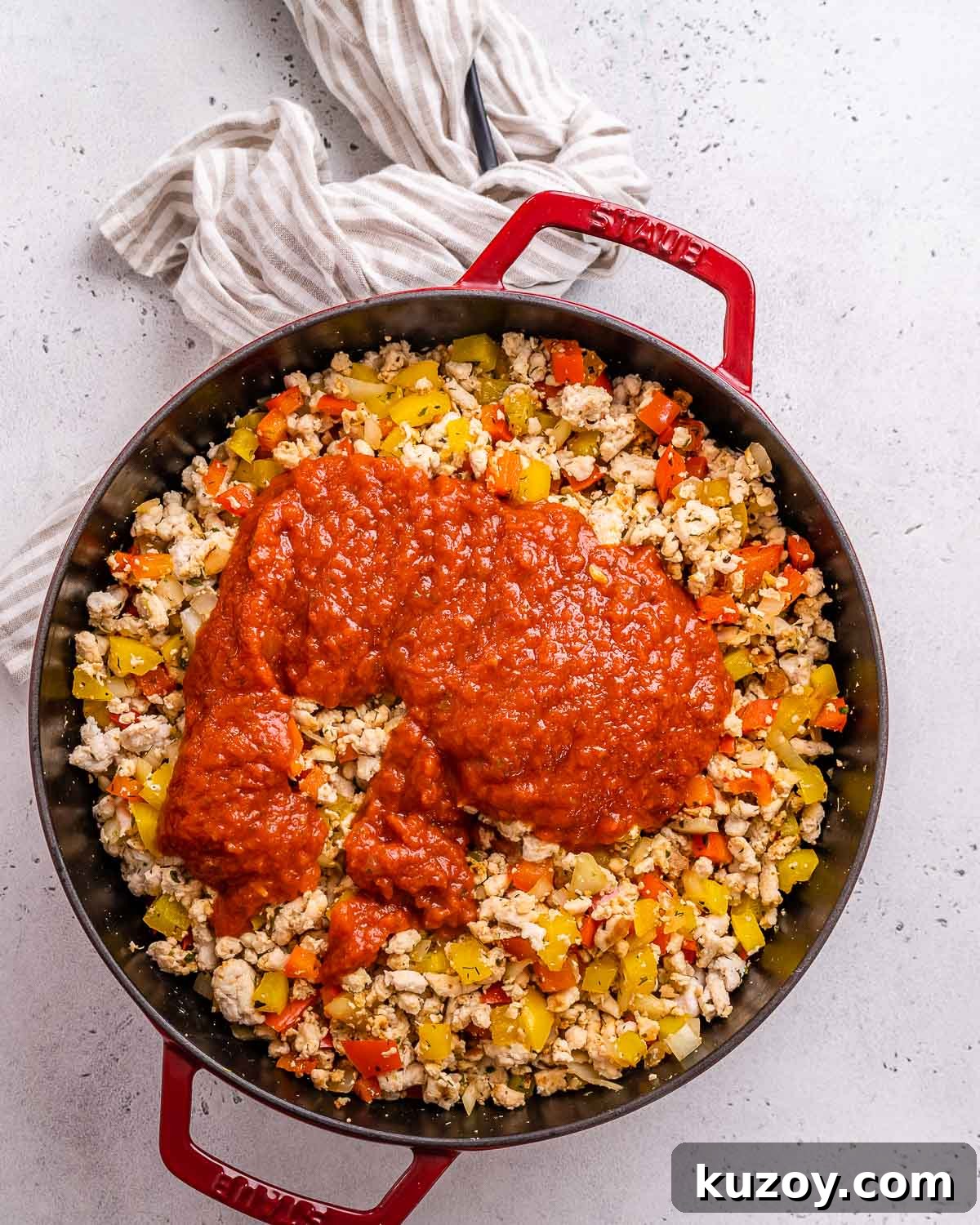 High-Protein Keto Pizza Bowls — Low-Carb Meal Prep 6 Marinara added to sauteed veggies and cooked meat to make low carb pizza bowls.
