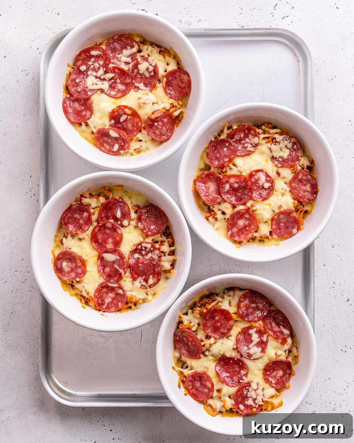 High-Protein Keto Pizza Bowls — Low-Carb Meal Prep 9 Baked low carb pizza bowls.