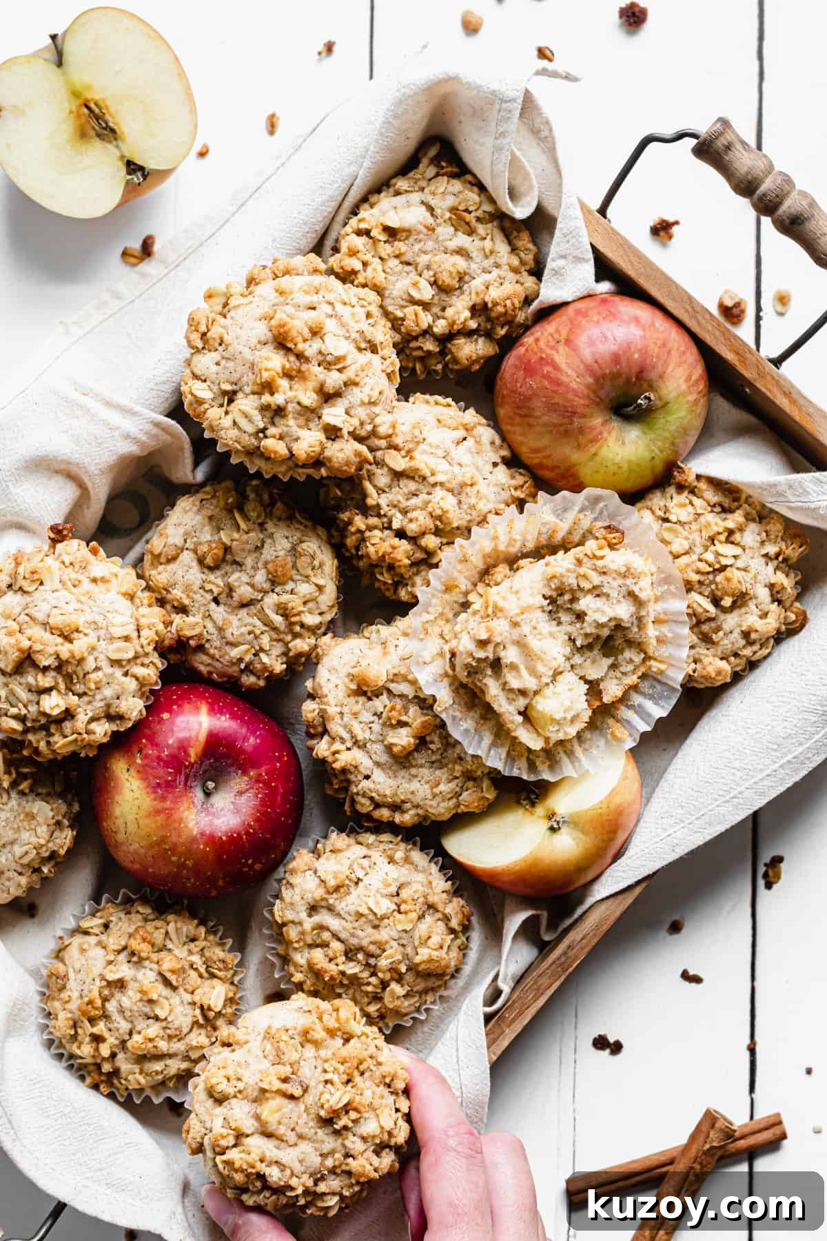 Cinnamon Apple Oat Crumble Muffins 2 overhead shot of the muffins in a wooden box with apples