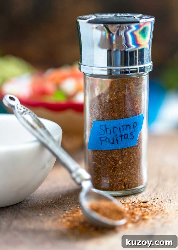 Shrimp Fajitas Seasoning Blend bottle with spoon