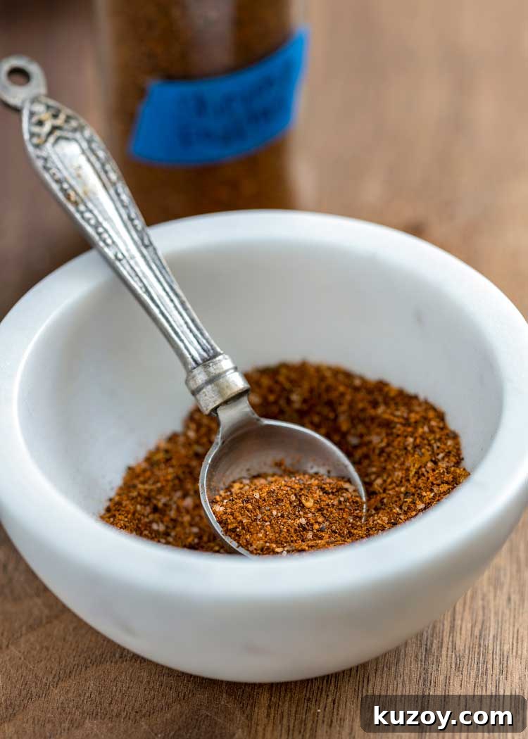 bowl of Shrimp Fajitas Seasoning Blend with spoon in it