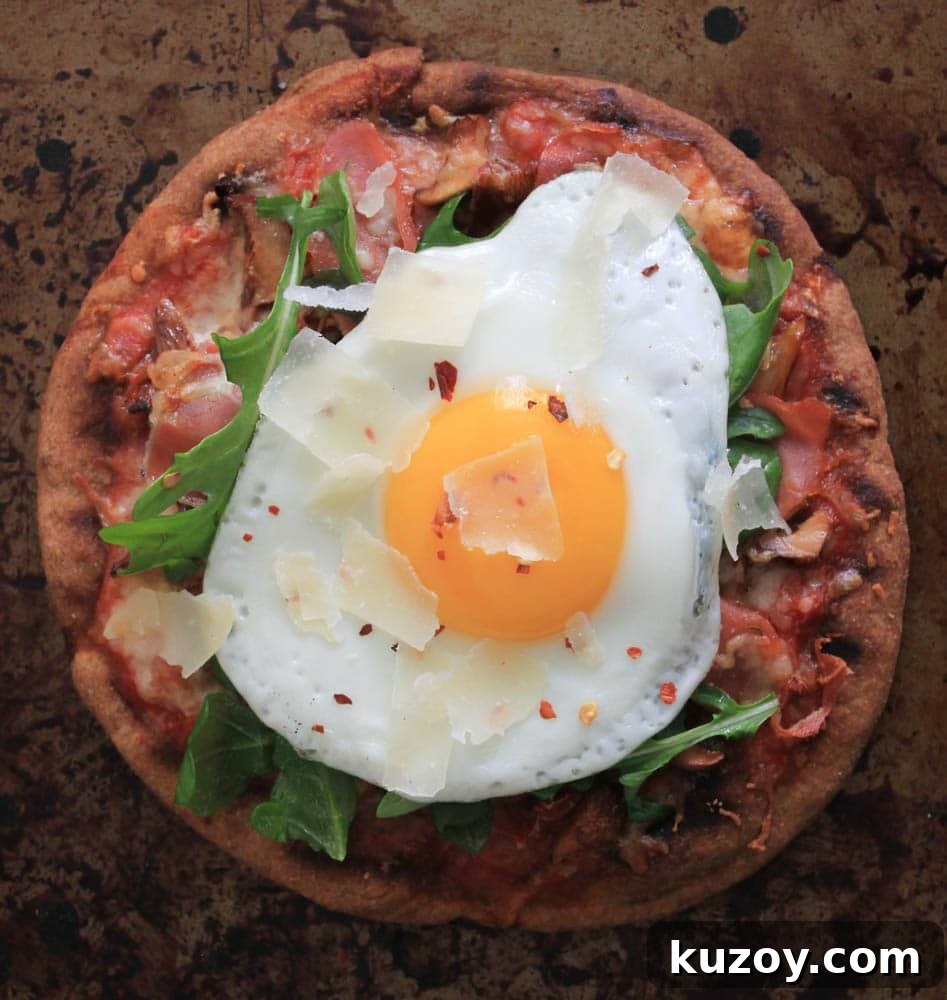 grilled-pita-pizzas-with-prosciutto-chanterelles-arugula-and-a-fried-egg-5