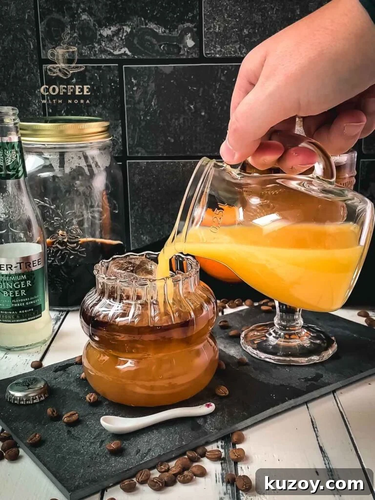 Ginger Cold Brew Recipe: Refreshing Iced Ginger Coffee 6 Pour orange juice into the glass layered with ginger beer and cold brew.