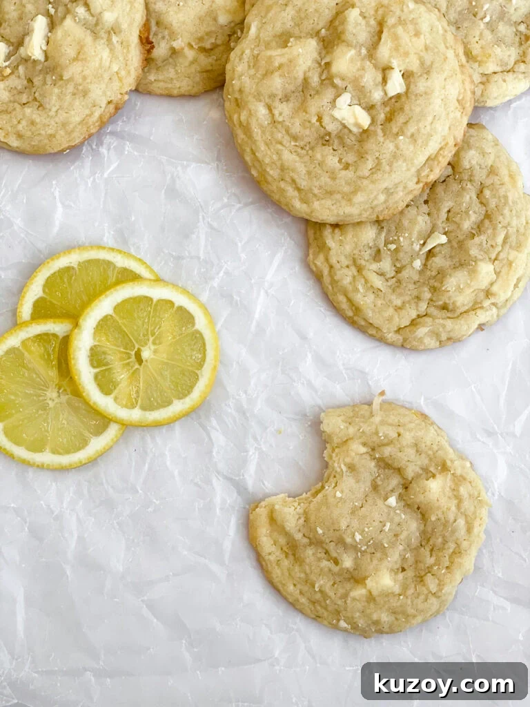 Lemon Coconut White Chocolate Cookie Recipe for Zesty Treats 11 a bite missing from one lemon coconut white chocolate cookie.