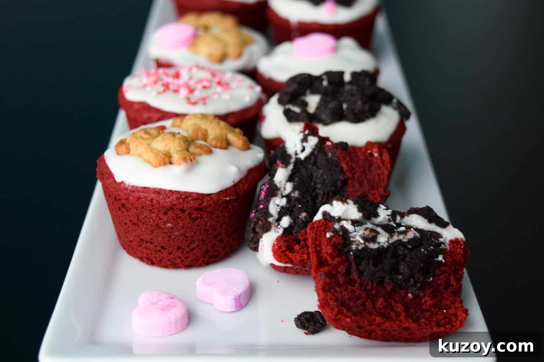 Red Velvet Oreo Valentine Dessert Cups: Romantic No-Bake Treats 3 Red Velvet Oreo Valentine Cups on white platter with conversation hearts close up view