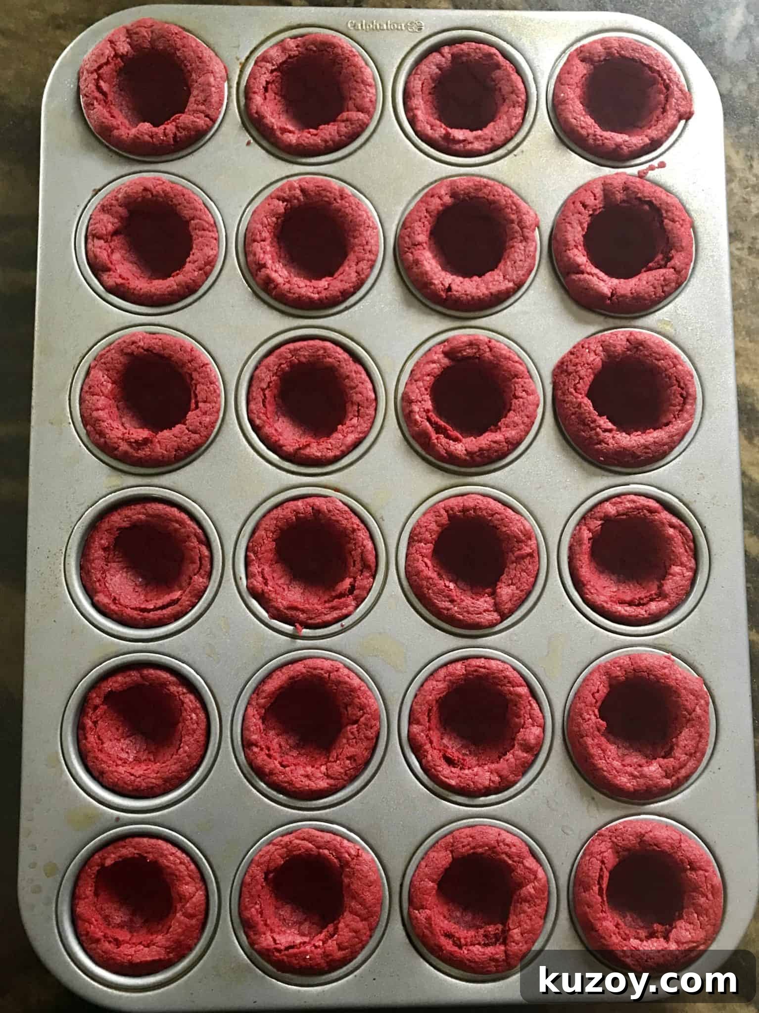 Red Velvet Oreo Valentine Dessert Cups: Romantic No-Bake Treats 5 red velvet cake mix balls baked in mini muffin pan overhead shot