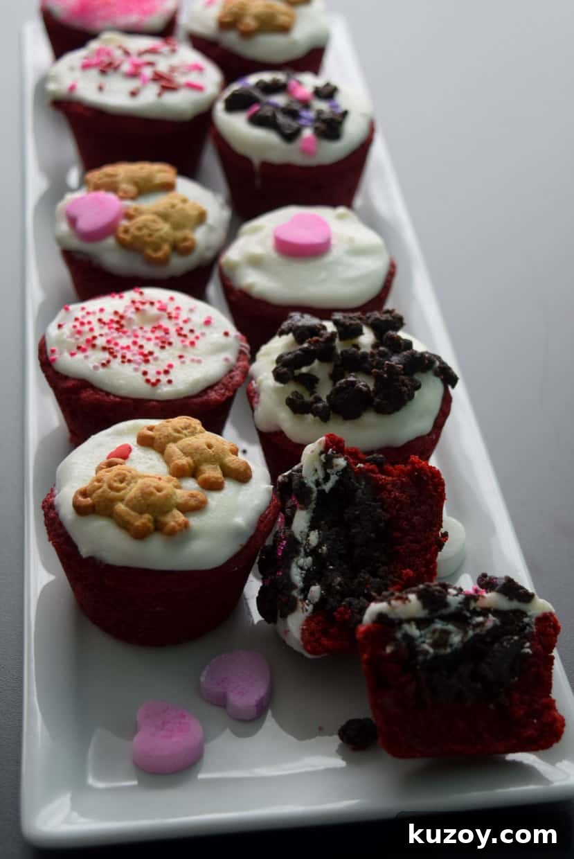 Red Velvet Oreo Valentine Dessert Cups: Romantic No-Bake Treats 7 Red Velvet Oreo Valentine Cups on white platter with conversation hearts close up view