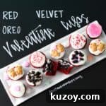 Red Velvet Oreo Valentine Cups on white platter with chalkboard writing