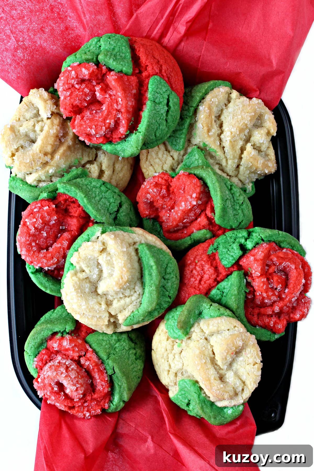 Red and white rose shaped sugar cookies.