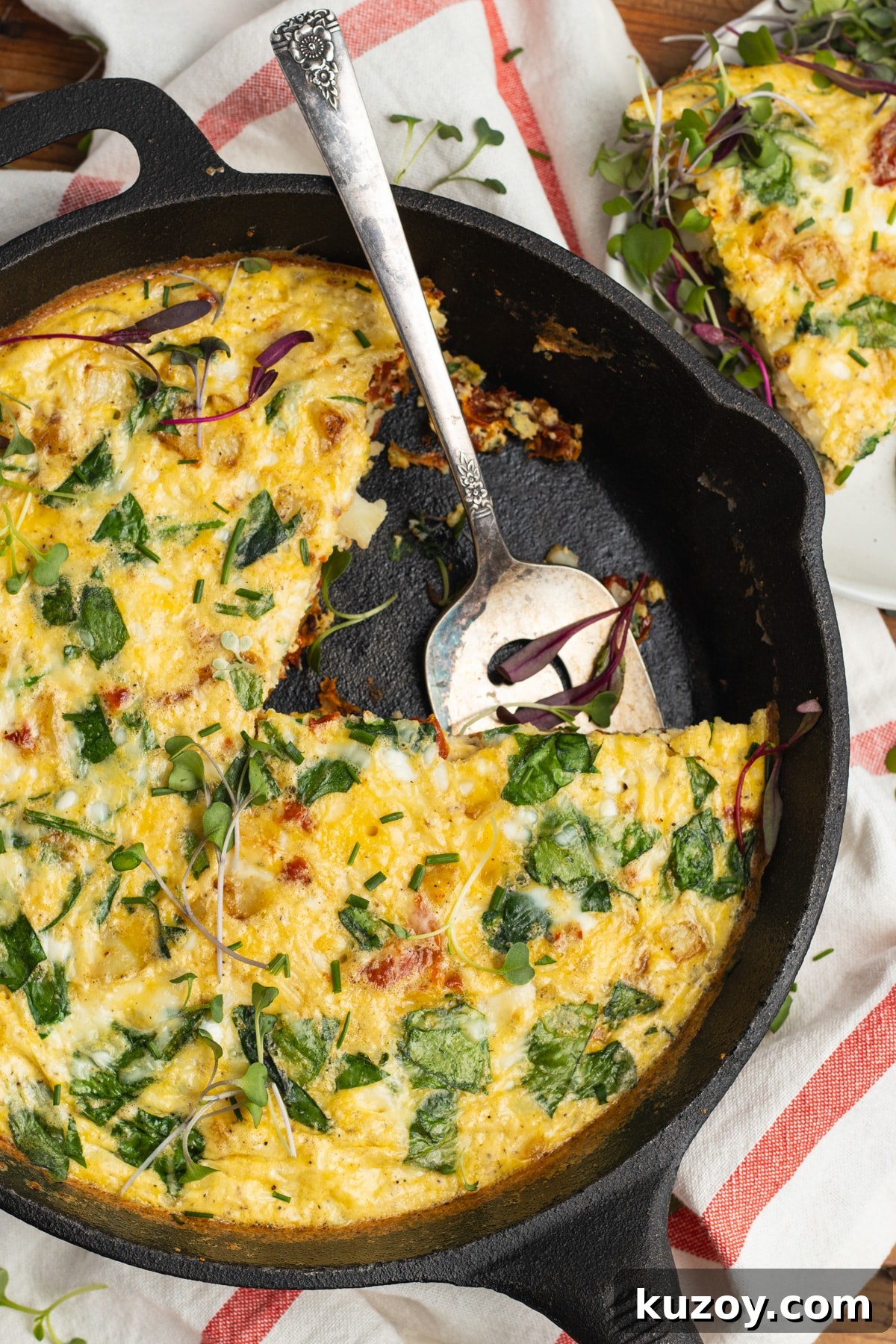 Sun-Dried Tomato and Cottage Cheese Frittata Recipe 2 This is a picture of the cooked cottage cheese frittata in a cast iron skillet.