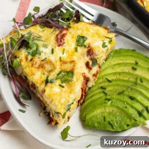Sun-Dried Tomato and Cottage Cheese Frittata Recipe 15 This is a square picture of a slice of frittata with avocado on the side.